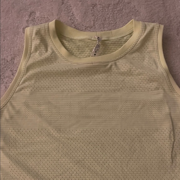 Set of two lulu tanks, one full length (Run Swiftly) and one cropped style. - Picture 5 of 6